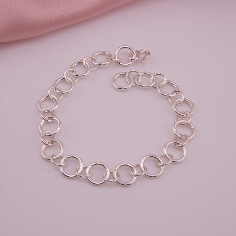 Hochglanzpoliertes Silber-Gliederarmband aus Sterling Silber mit S-Haken-Verschluss in 10 mm Breite.